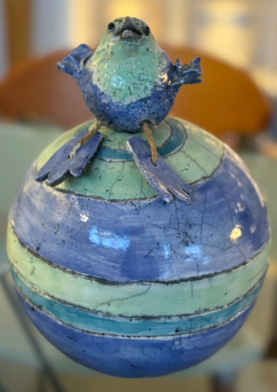 Kugelurne Vogel
