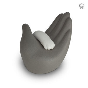 Pfote in Hand - Tierurne
